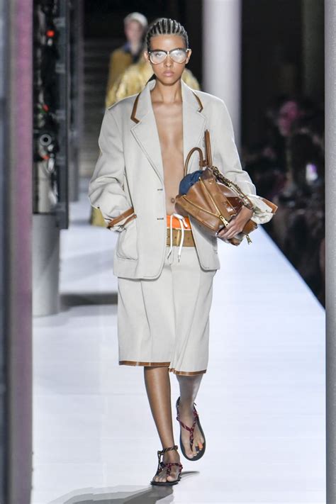 Miu Miu's Spring 2024 Models Carried Bags Stuffed With Stuff